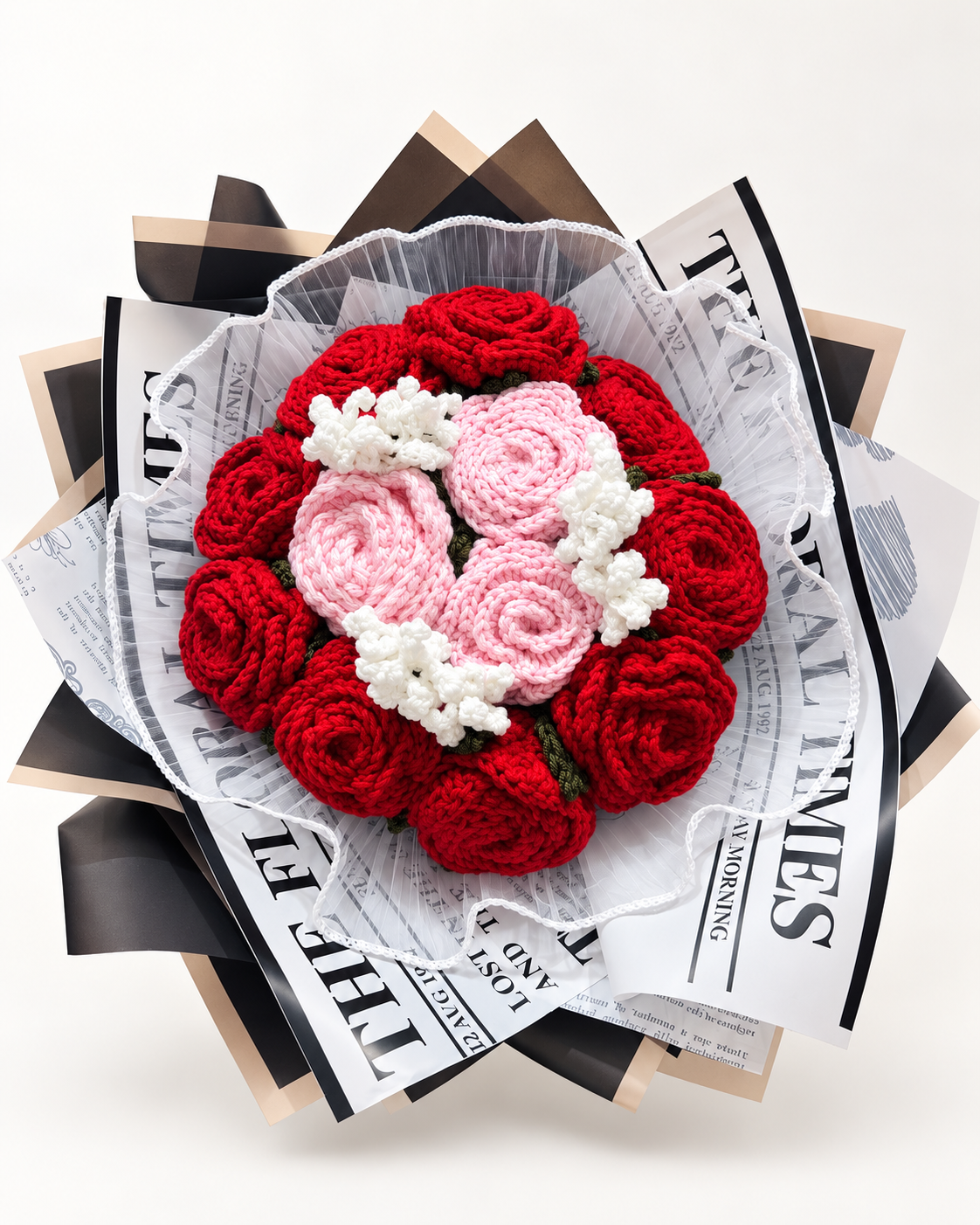 Always & Forever Bouquet viewed from above, with red and blush pink crochet roses and white fillers.