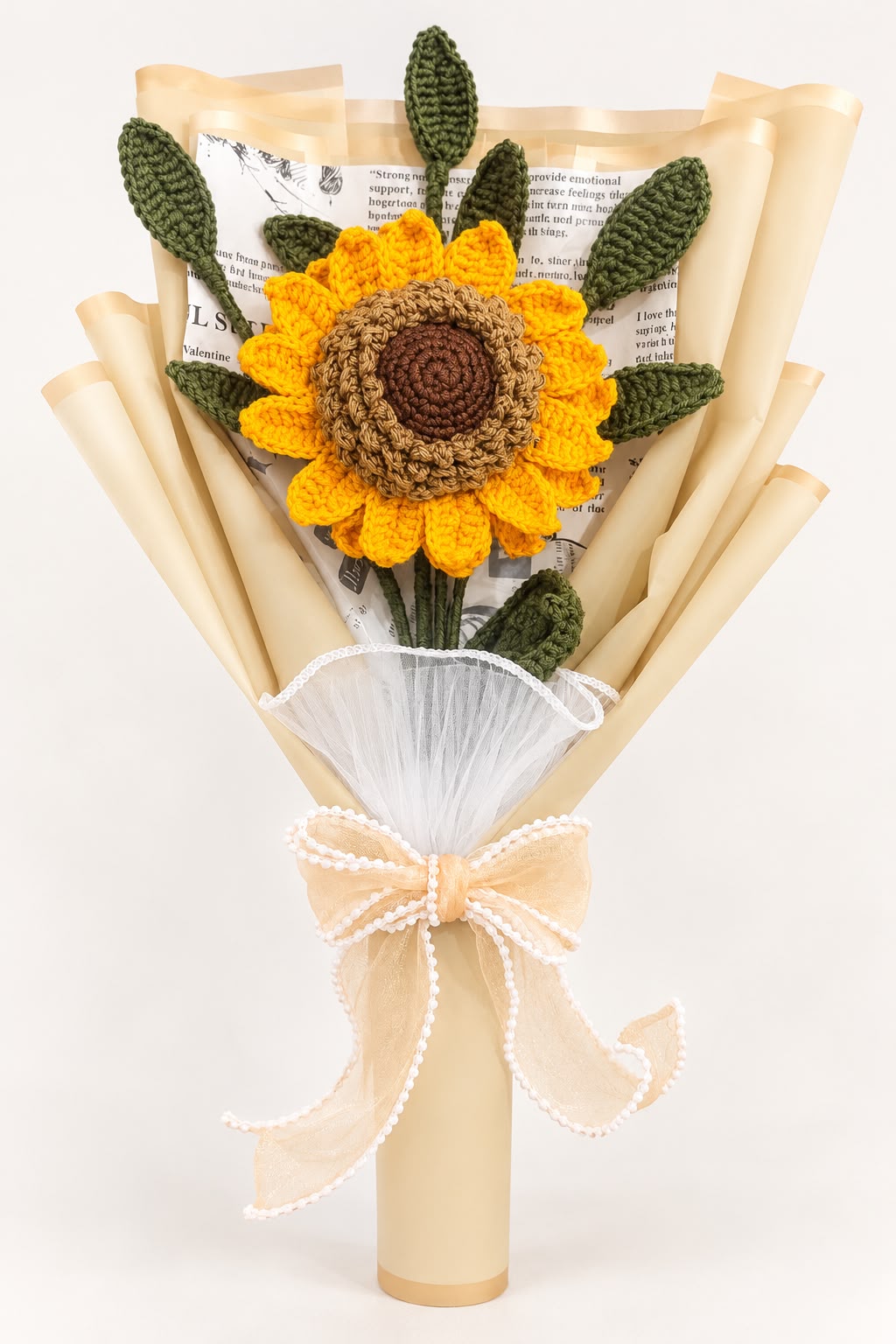 Oversized handmade crochet sunflower bouquet with cream wrapping and ribbon