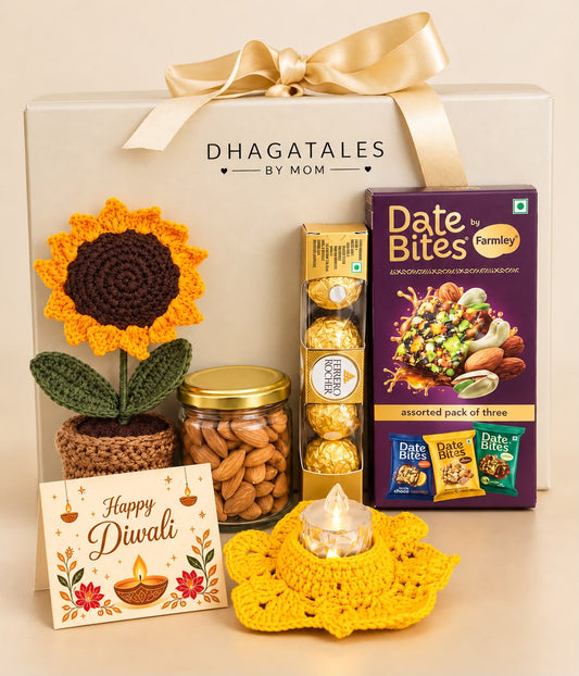 Forever Festive Diwali gift hamper with crochet sunflower pot, almond jar, Farmley Date Bites assorted box, Ferrero Rocher, yellow crochet holder, tealight and Diwali card