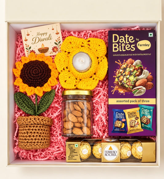 Overhead view of Forever Festive hamper contents in an ivory gift box with pink paper filling