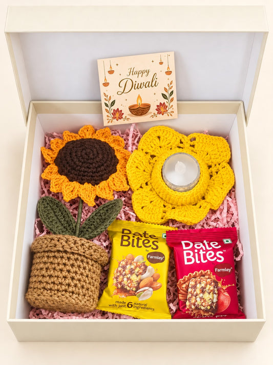 Sunflower Joy hamper arranged in an open ivory gift box with pink paper filling