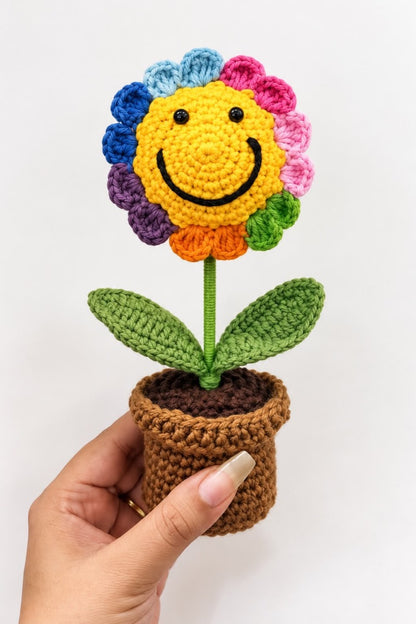 Rainbow Joy Bloom Pot held in one hand to show its relative size